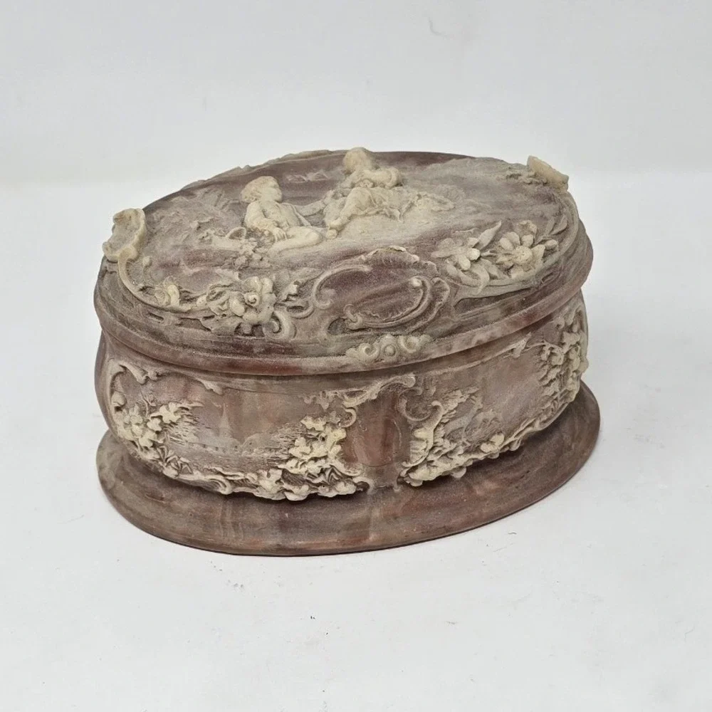 Vtg Incolay oval trinket box pink Cherub relief jewelry case Victorian scene
